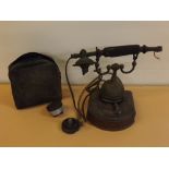 Vintage brass composition and treen based telephone with some of the detached parts (a/f)