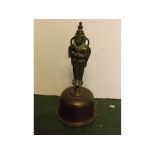 Eastern cast bronze hand bell with double-sided figure handle with etched bell, 12ins tall