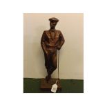 Copper-coloured plaster or resin figure of a golfer, base signed A Danel (Austin Productions Inc