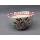 18th century (possibly Lowestoft) tea bowl, decorated in floral sprigs, puce painted interior rim,