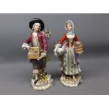 Pair of 19th century Derby figures of a lady holding a goose and basket, together with a gent with a