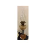 Victorian oil lamp with clear ribbed font, twisted column, on a copper circular base, 27 1/2 ins