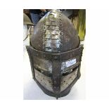 Modern iron helmet of hinged and riveted construction (face guard rivets lacking), height 12 ins