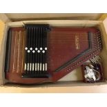 Boxed "Autoharp", together with assorted accessories and instructions