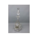 Clear glass decanter with faceted neck and cut diamond body with matching stopper, silver plated