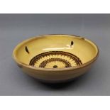 Small slip-ware style Art pottery bowl with impressed initials ST to reverse, 5ins diam