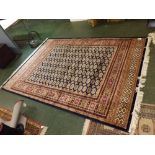 @Modern Bokhara type carpet, 75 x 55ins