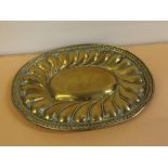 Antique embossed oval brass wall hanging dish/plaque, 14ins x 12ins