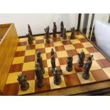 Modern 1970s chess set by Yeovil Precision Castings Ltd with cast bronze figure chess pieces and