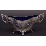 George V Continental table basket with beaded rim, cast and applied floral and foliate side handles,