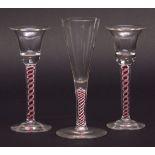 18th century style conical champagne flute and two similar but non-matching wine glasses, all with