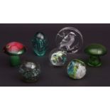 Collection of 7 various 20th century coloured and clear glass paper weights, various sizes (7)