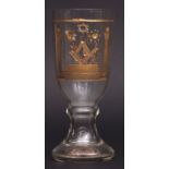 Bohemian clear glass pedestal goblet, gilded and engraved with Masonic motifs and the rim also