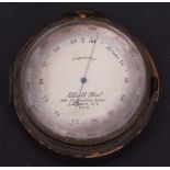 Late 19th/early 20th century gilt and brass cased pocket barometer/altimeter with outside scale of