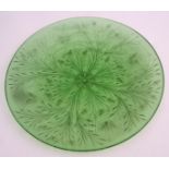 20th century decorative pale green glass circular dish, well engraved with butterflies, spiders webs