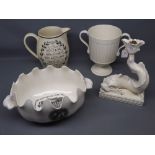 Wedgwood cream glazed two-handled trophy cup together with a further white glazed Wyvern lamp (a/