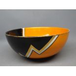 Carlton Ware orange and black glazed lightning design circular bowl, 9ins diam