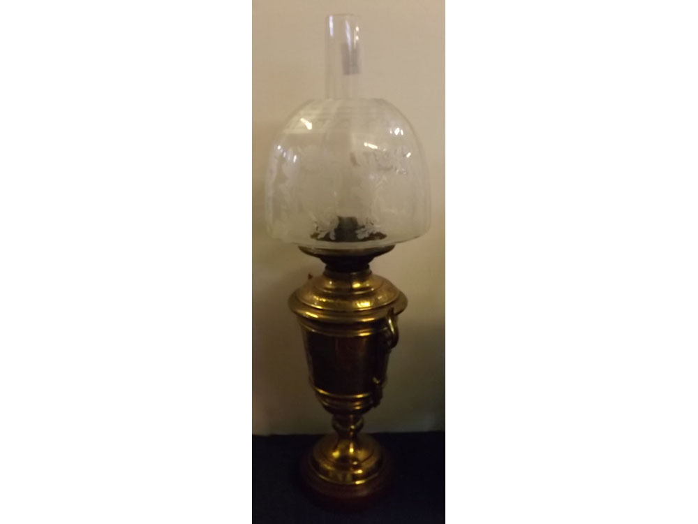 Victorian brass and engraved vase shaped oil lamp with clear etched floral shade, 23 1/2 ins tall