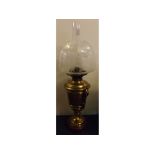 Victorian brass and engraved vase shaped oil lamp with clear etched floral shade, 23 1/2 ins tall