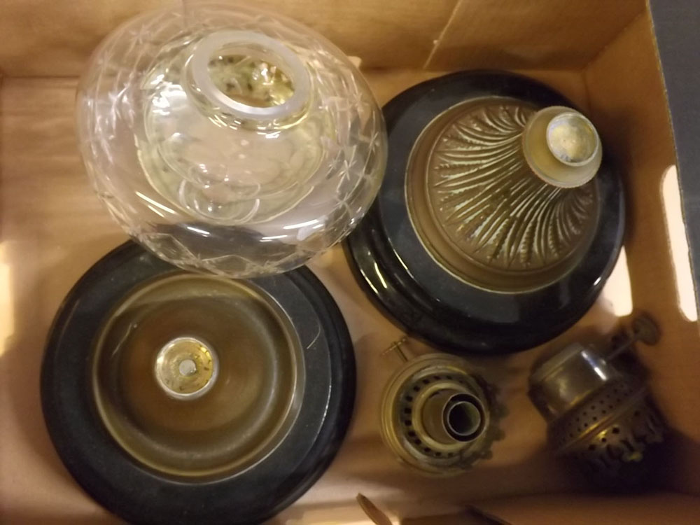 Box of assorted items including oil lamp parts, horn etc