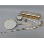 Mixed Lot: silverwares to include clothes brush, button hook, hand mirror, engine turned napkin