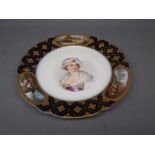 19th century Sevres plate, the centre painted with a bust of a young lady with gilded border,