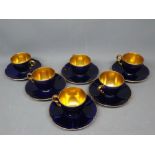 Set of six Crown Devon blue and gilded cups and saucers, (6)