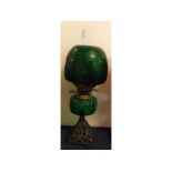 Victorian cast iron based oil lamp with green glass font, green glass shade, 21ins tall