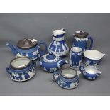 Nine various pieces of Wedgwood jasperware to include a three-piece silver mounted tea set, silver