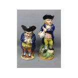 Staffordshire Toby Jug of The Hearty Good Fellow together with one further smaller example,