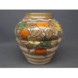 Charlotte Rhead ribbed vase with fruit and leaf decoration, printed marks to base and impressed mark