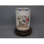 Chinese export cylindrical vase with decorative painted decoration together with a carved stand (a/