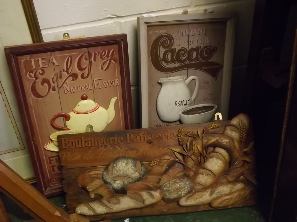 Group of three reproduction wooden wall plaques relating to bread, tea and cocoa, various small