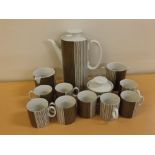 Thomas Germany Arabesque tea wares comprising 8 coffee cans and 8 white glazed saucers, lidded sugar