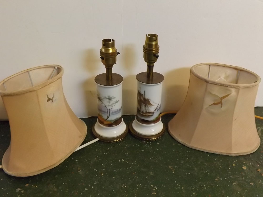 Pair of cylindrical ship painted electric lamps with brass cap and cylindrical base, puce shades,