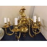 Reproduction eight-branch brass chandelier with knopped column and scrolling arms, 27ins drop x