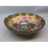 Iridescent green carnival glass bowl with raised acorn decoration, 8ins diam