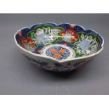 19th century Imari decorated bowl with shaped edge, predominantly green, red and blue, 9ins diam