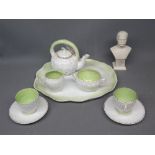 Continental cabbage leaf design bachelor's tea set comprising two cups and saucers, cream jug and