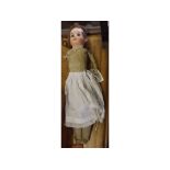 Bisque porcelain faced doll with glass eyes in period clothing, (a/f), 14ins