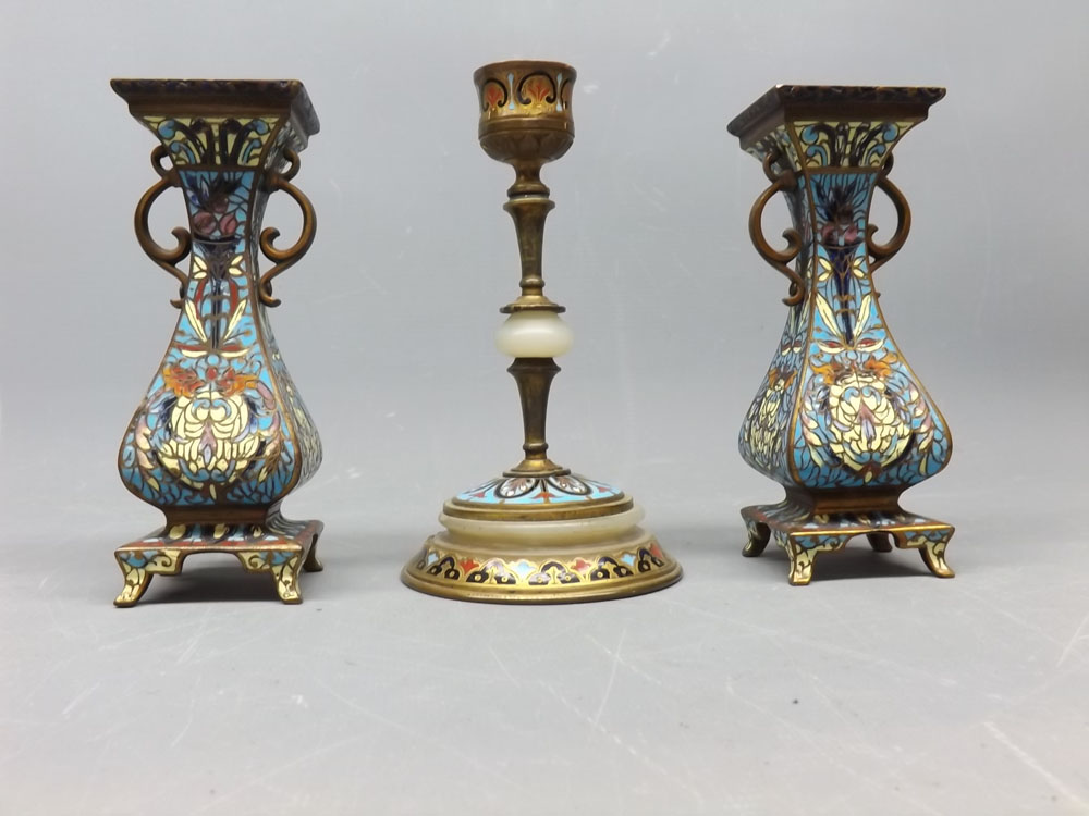 Pair of enamelled square formed two-handled vases with waisted sides on stepped base, together