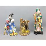 Two Chinese decorated figures together with a further Japanese model of an elephant and tiger,