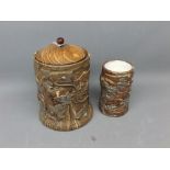 Two Silicon ware trunk formed vases, with raised lustre decorated ivy vines throughout, with