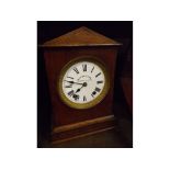 Oak cased mantel clock by R & T McInnes of Newcastle upon Tyne with enamelled Arabic chapter ring,