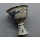 Small Chinese porcelain stem cup with crackle glaze decorated in underglaze blue with stylised