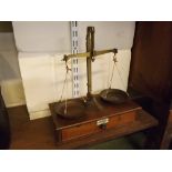 Brass and mahogany set of Avery scales with Ivorine plaque and pull out drawer, 12ins wide x 13ins