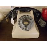 Ivory Bakelite telephone with a black Bakelite receiver, model no 9T/ATS