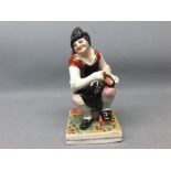 19th century Staffordshire model of a cobbler, 7ins tall