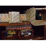 Four boxed Scalextric to include an event board and hut, a racing pit, a further grandstand and a