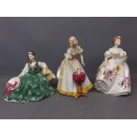 Three Royal Doulton figures to include 'Elyse' model no HN2474, 'Marilyn' model no HN3002 and 'Happy